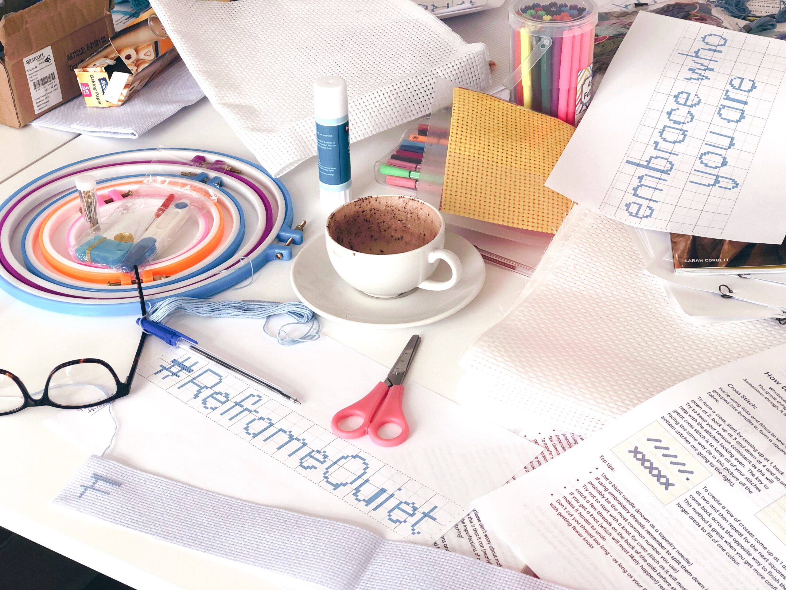 Reframe Quiet creative materials arranged on a table